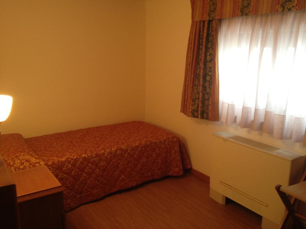 Hotel Il Guscio Grado Pokoj fotografie